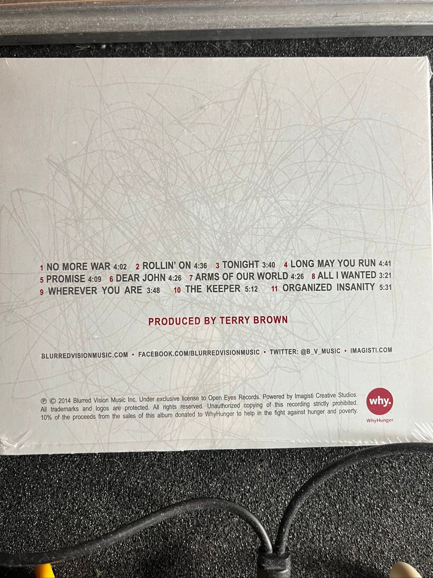 Back cover of CD Digipak Album with Tracklisting.