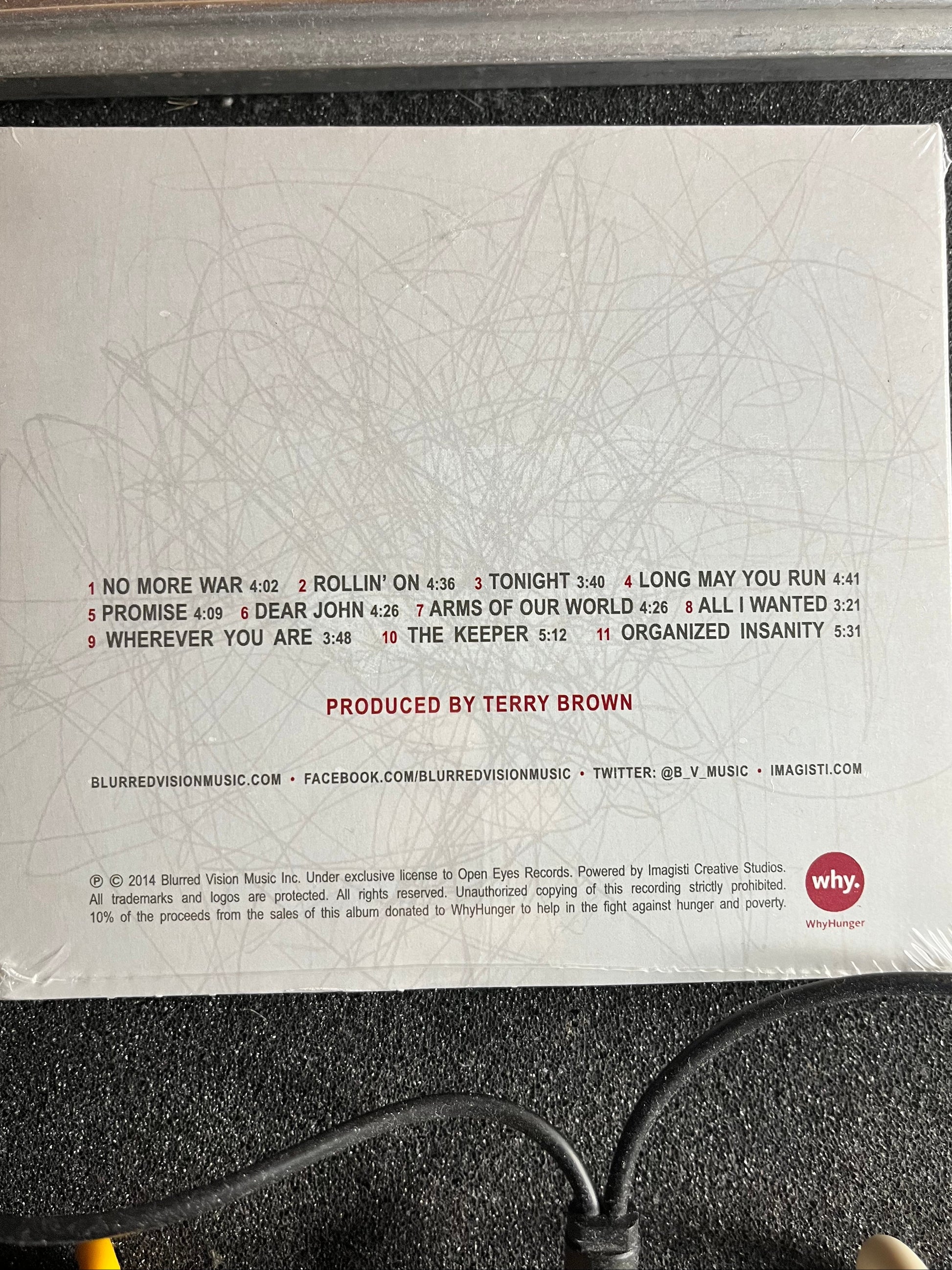Back cover of CD Digipak Album with Tracklisting.